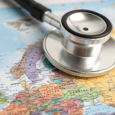 Map of Europe with a stethoscope on top of it.