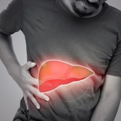 Man experiencing liver pain.