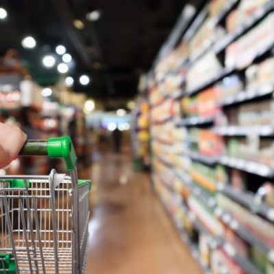 Woman pushing a shopping cart