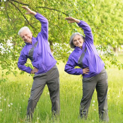 Fit senior couple exercising