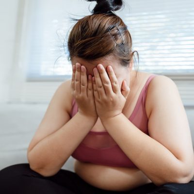 Teenager with obesity experiencing depression