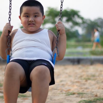 Child playing in playground.