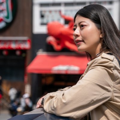 Japanese lady in a city.