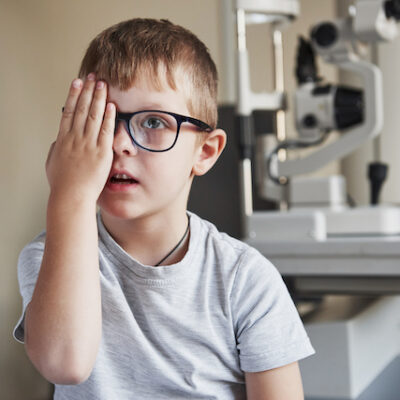 Child taking an eye exam.
