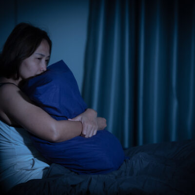 Woman having trouble sleeping.