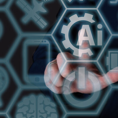 The finger clicks on the artificial intelligence icon.