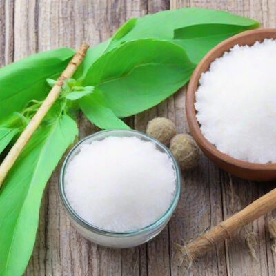 A pile of sugar and stevia sweetener on a table.