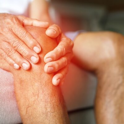 Elderly man with arthritis and knee pain.