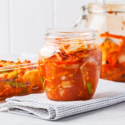 Kimchi cabbage in a glass jar.