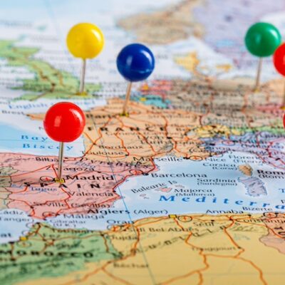 Map of Europe with pins in it.