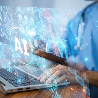 Doctor uses AI application in healthcare setting.
