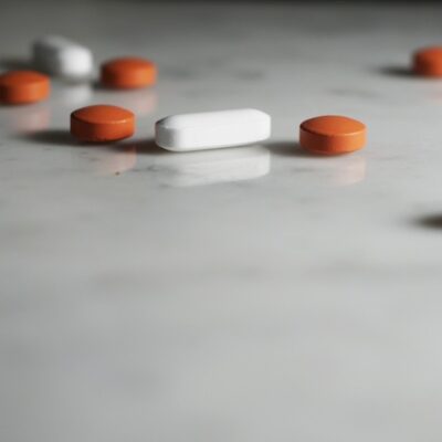 Various pills on a counter.