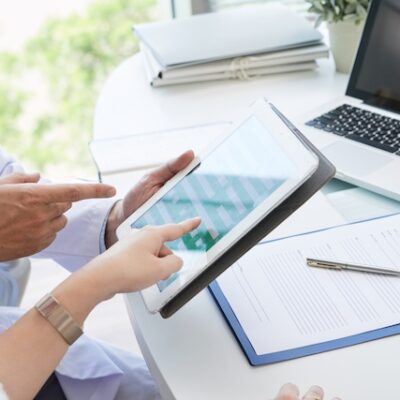 Doctors using digital health tools.