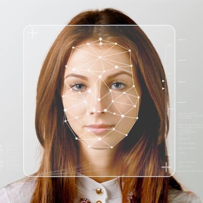 Woman having here face scanned by AI.
