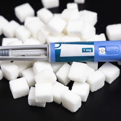 Ozempic Insulin injection pen on a dark background for diabetics and weight loss.
