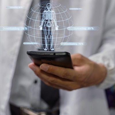 Doctor using an AI application on smartphone.
