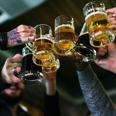 People celebrating with beers.