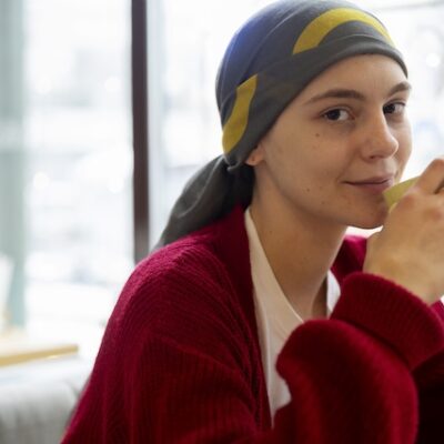 Young woman going through cancer treatment.