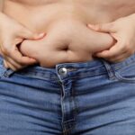 Visceral fat on a middle aged woman.