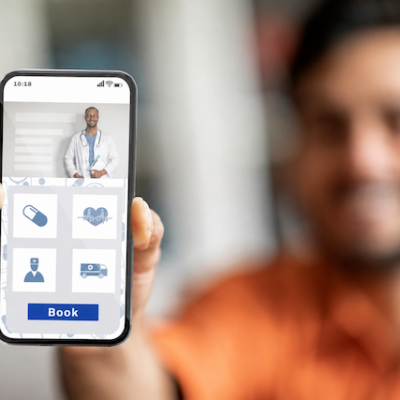 Man using a healthcare app on his smartphone.