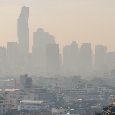 Air pollution enveloping a city.