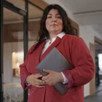Portrait of a woman working in an office.
