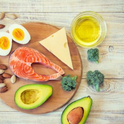 Keto diet food ingredients set out on a table.