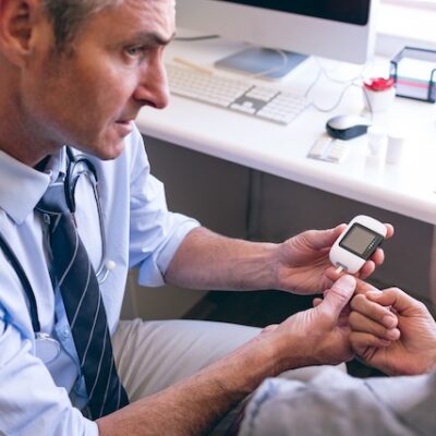Doctor speaking with patient with diabetes.